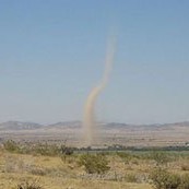 This image has an empty alt attribute; its file name is dustdevil.jpg